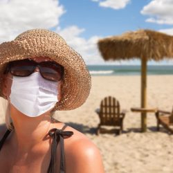 British vacationers are required to wear face masks on the beaches of Portugal or risk a fine of 100 euros