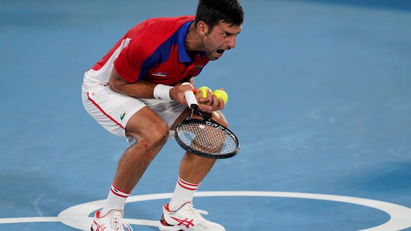 Djokovic gets upset when he misses an attempt against Alexander Zverev in the Tokyo semi-finals