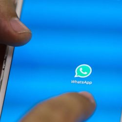 How do I get a message regarding emergency assistance on WhatsApp?