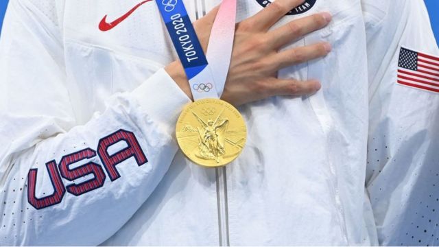 An American athlete was photographed with a gold medal