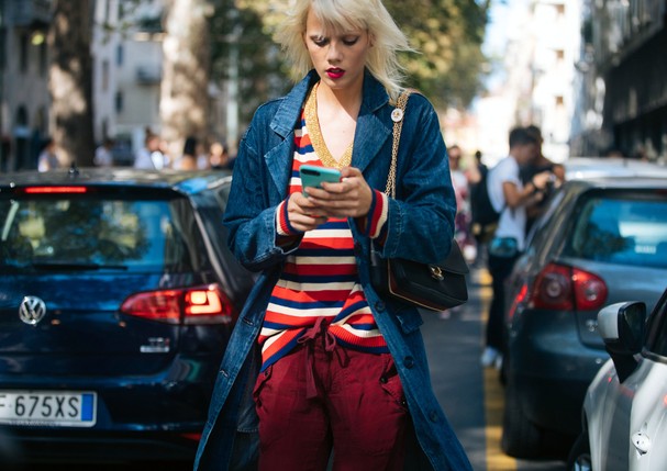 Milan, Italy - September 23: Model Marjan Jongman checks out his mobile phone after the Dolce & Gabbana show during Milan Fashion Week Spring / Summer 2019 in Milan, Italy on September 23, 2018.  (Photo: Getty Images)