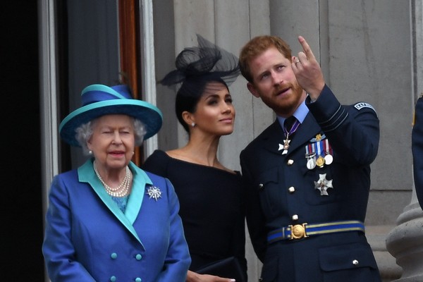 Queen Elizabeth, Megan Markle and Prince Harry (Photo: Getty)