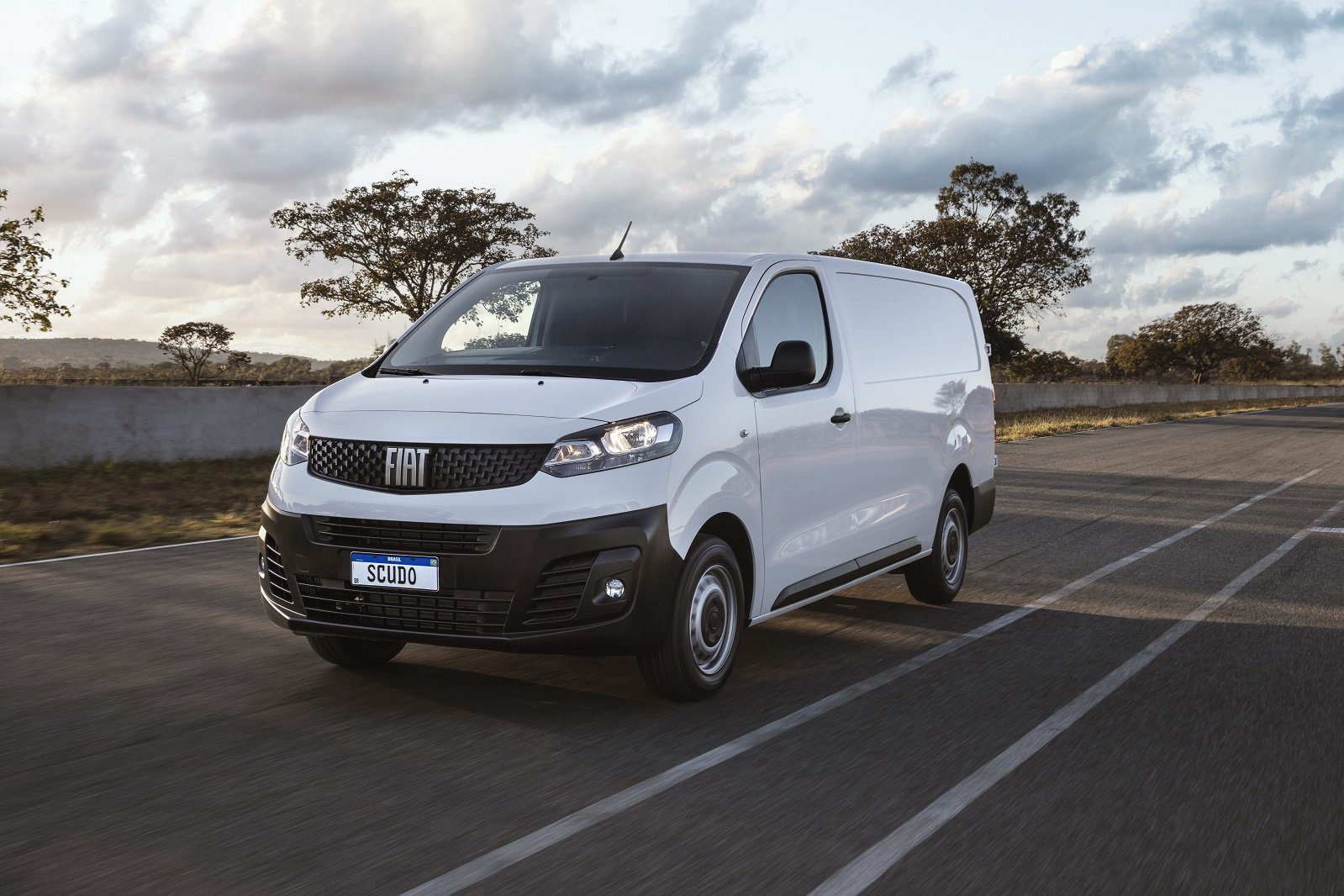 White Fiat Scudo Cargo front moving on the road