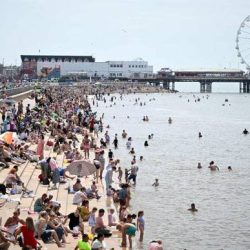 England’s heatwave brings thousands to beaches