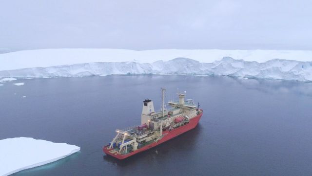 The R/V Nathaniel B. Palmer ship, used by scientists, is photographed from a drone in front of Thwaites Glacier in February 2019