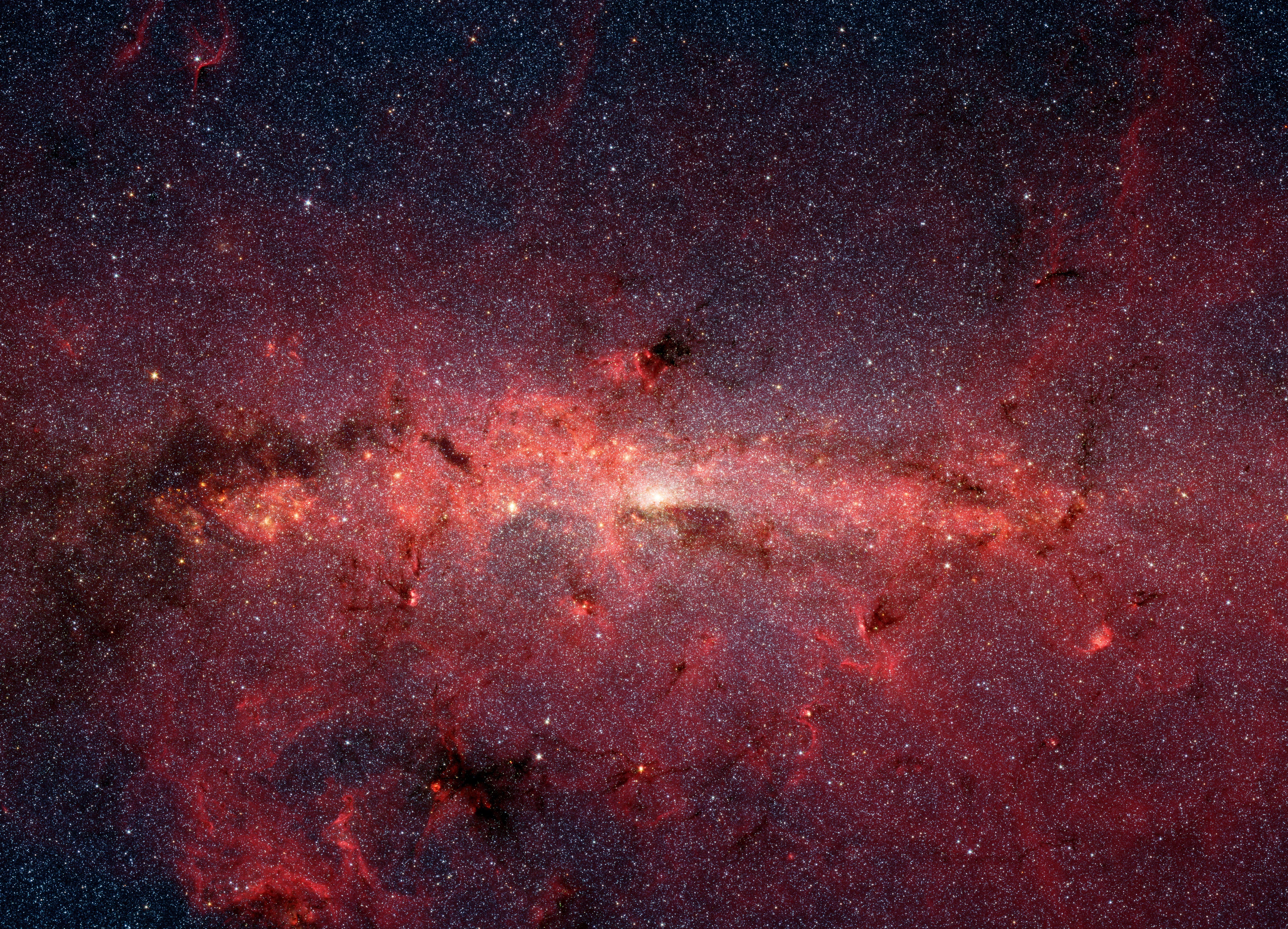 The Milky Way and a large cluster of thousands of stars in its center - NASA / JPL-Caltech - NASA / JPL-Caltech